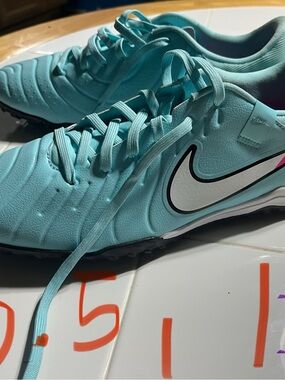 Nike Aqua Blue Turf Soccer Shoes with White Swoosh
Size 8.5 and 10